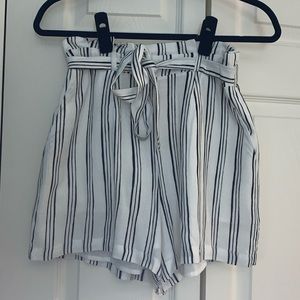 Jennifer Lopez black and white shorts